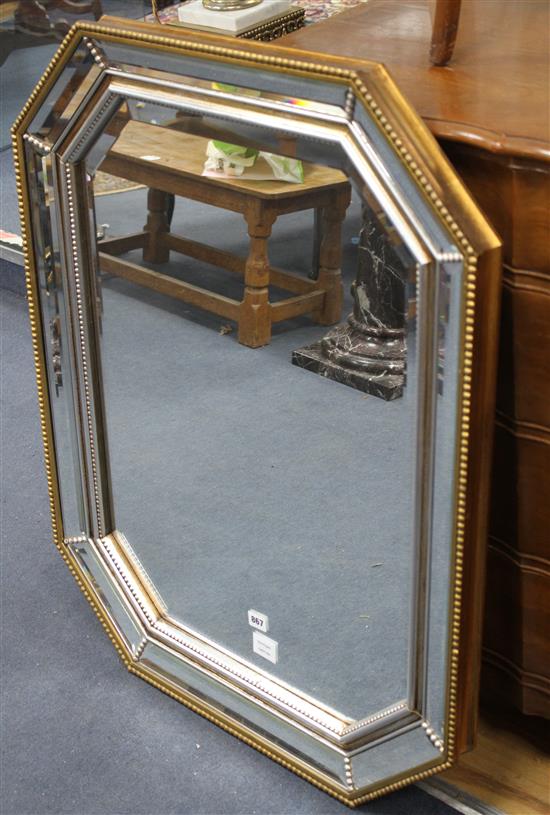 A reproduction octagonal marginal plate wall mirror, W.74cm H.94cm